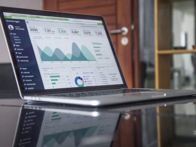 Laptop displaying graphs