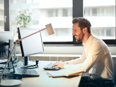 man working on his computer